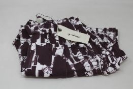 Eleven items of assorted Mama B clothing.