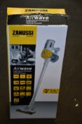A new Zanussi Airwave Yellow cordless rechargeable 130W, 1Ltr 3 in 1 hand stick vacuum cleaner (