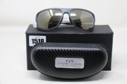 A pair of as new Henrik Stenson Torque 3.0 sunglasses.