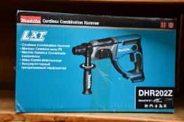 A boxed Makita Cordless combination hammer (DHR202Z).