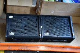 A pair of Carlsbro Demio monitor speakers.