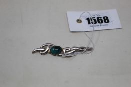 A silver Paul Edward Bunn Lapidary brooch.