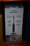 A Tineco Floor One S3 smart cordless vacuum and wash.