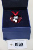 A Swarovski 2005 Heart Ornament. This retired Swarovski annual edition heart pendant was available