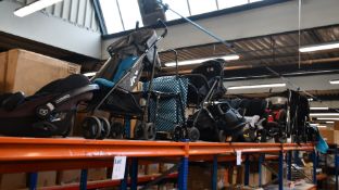 Eight pushchairs/buggies, six car seat/booster seats and two wheelchairs.