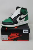 A pair of youths as new Nike Air Jordan 1 Retro High OG OS (UK 4.5).