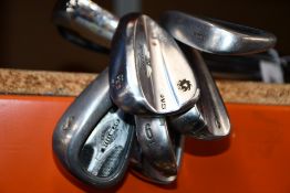 Seven branded pre-owned golf irons to include; four Callaway steelhead clubs, a Titleist SM6, a
