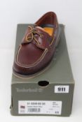 A pair of as new Timberland Boat 2 Eye shoes (UK 9).