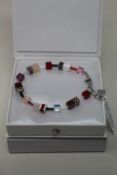 Two as new Coeur De Lion Red Purple Swarovski Crystal Bracelet 4905/30-0308 (RRP £95).