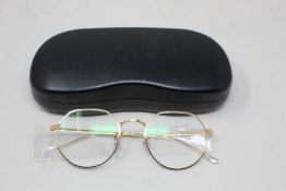 A pair of as new Ray Ban glasses frames.