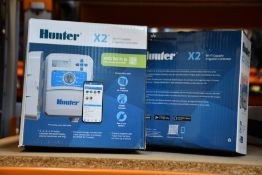 Two boxed as new Hunter 14 station Wi-Fi capable irrigation controllers.