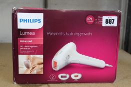A boxed Philips Lumea advanced hair regrowth prevention device for body and face (Outer box has
