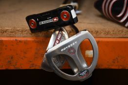 Three Callaway Odyssey putters to include; an as new Hot White Pro 9 putter, a pre-owned O-Works