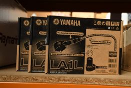 Three as new Yamaha LA1L gooseneck lamps.