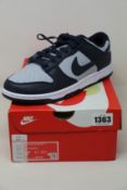A pair of as new Nike Dunk Low Retro (UK 7.5).