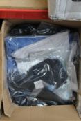 A quantity of assorted as new Skechers socks (3 pair packs and 6 pair packs, two jackets, three T-