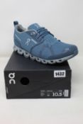 A pair of as new On Running Cloud waterproof trainers (UK 10).