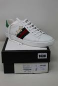 A pair of as new Gucci sneakers (EU 38 - RRP £525).