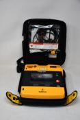 A pre-owned Medtronic Lifepak 1000 Defibrilator.