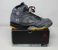 A pair of as new Nike Jordan 5 Retro Off-White sneakers (UK 10).
