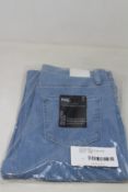 A pair of as new Paige Relaxed Colette jeans (Size 31).