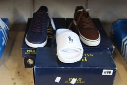 Three pairs of as new Ralph Lauren footwear; Hanford sneakers (UK 8), Cayson slides (UK 7) and a