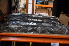 Four Dakine surf accessories aero rack pads (18in) and three Dakine rack pads (34