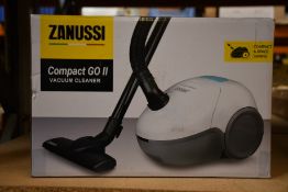 A new Zanussi Compact Go ll White, 750W, 1.5L, 5M automatic cord rewind vacuum cleaner.