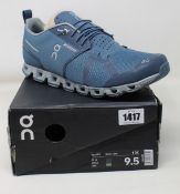 A pair of as new On Running Cloud waterproof trainers (UK 9).