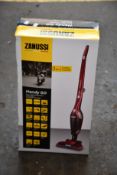 A new Zanussi Red Handy Go 2 in 1, 95W, 0.55L rechargeable cordless vacuum cleaner (ZANDX75).