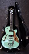 An as new Duesenberg Starplayer TV Electric Guitar in Surf Green with case and accessories.