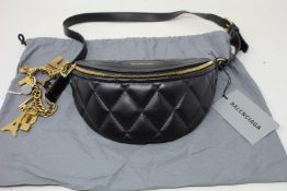 A Balenciaga leather bum/waist bag (Possibly older model but complete with tags).