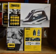 Four new Zanussi blue 2800W steam irons (ZSI 9270).