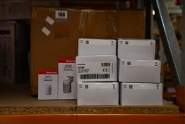 A large quantity of boxed as new Honeywell IS312B Pet Tolerant Passive Infrared Motion Sensors