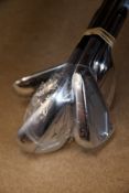 Five branded golf clubs to include; an as new Mizuno JPX 921 7 iron, an as new Srixon ZX7 5 iron and