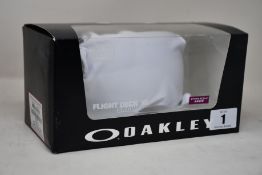 A pair of as new Oakley Flight Deck XL ski goggles.