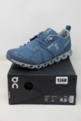 A pair of as new On Running Cloud waterproof trainers (UK 9).