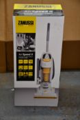 A new Zanussi Air Speed ll bagless cyclonic upright vacuum cleaner (ZAN2020UR).