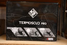 An as new TermoScud Tucano Urbano R062 Pro - Piaggio MP 3 leg cover.