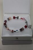 Two as new Coeur De Lion Red Purple Swarovski Crystal Bracelet 4905/30-0308 (RRP £95).