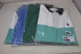 Four as new Ralph Lauren polo shirts (3 x M, 1 x LT).