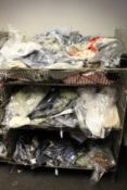 A quantity of as new clothing and related items.