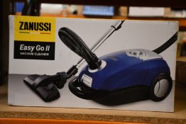 A new Zanussi Easy Go ll Blue 3L, 700W, 7.5M radius retractable cord vacuum cleaner.