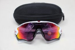 A pair of as new Oakley Jaw Breaker sunglasses with Prizm Road lens.