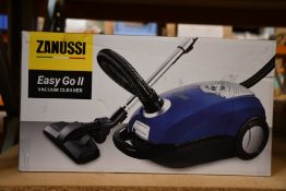 A new Zanussi Easy Go ll Blue 3L, 700W, 7.5M radius retractable cord vacuum cleaner.