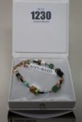 Two as new Coeur De Lion Geo Cube Gree-Beige and Rose Bracelet 4905/30-0510 (RRP £95).