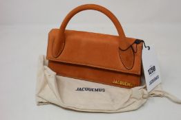 An as new Jacquemus Le Chiquito Long bag in dark orange (RRP £465).