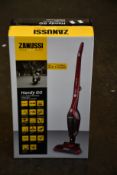 A new Zanussi Red Handy Go 2 in 1, 95W, 0.55L rechargeable cordless vacuum cleaner (ZANDX75).