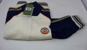 An as new Gucci track jacket (S).