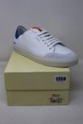 A pair of as new Axel Arigato Clean 90 Triple sneakers (UK 9).